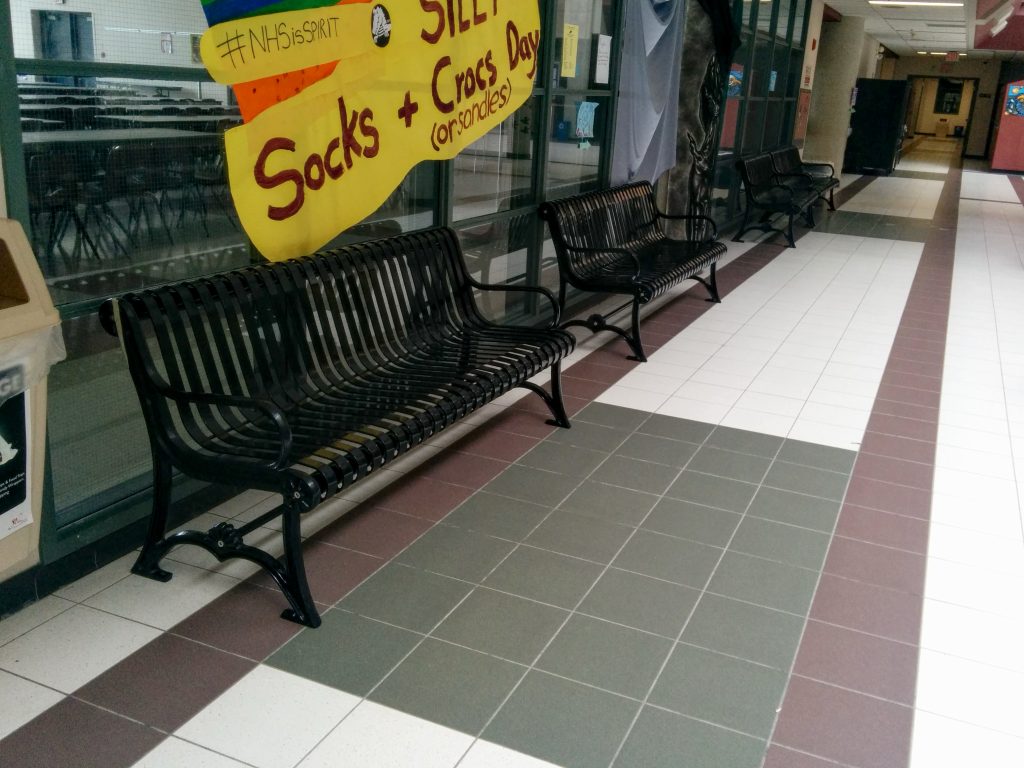 Commercial Outdoor Metal Bench SPB-301 glossy black in a school indoor